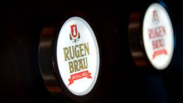 A close-up of a bottle label with the text "RUGEN BRAU" and "SPECIAL HELL".