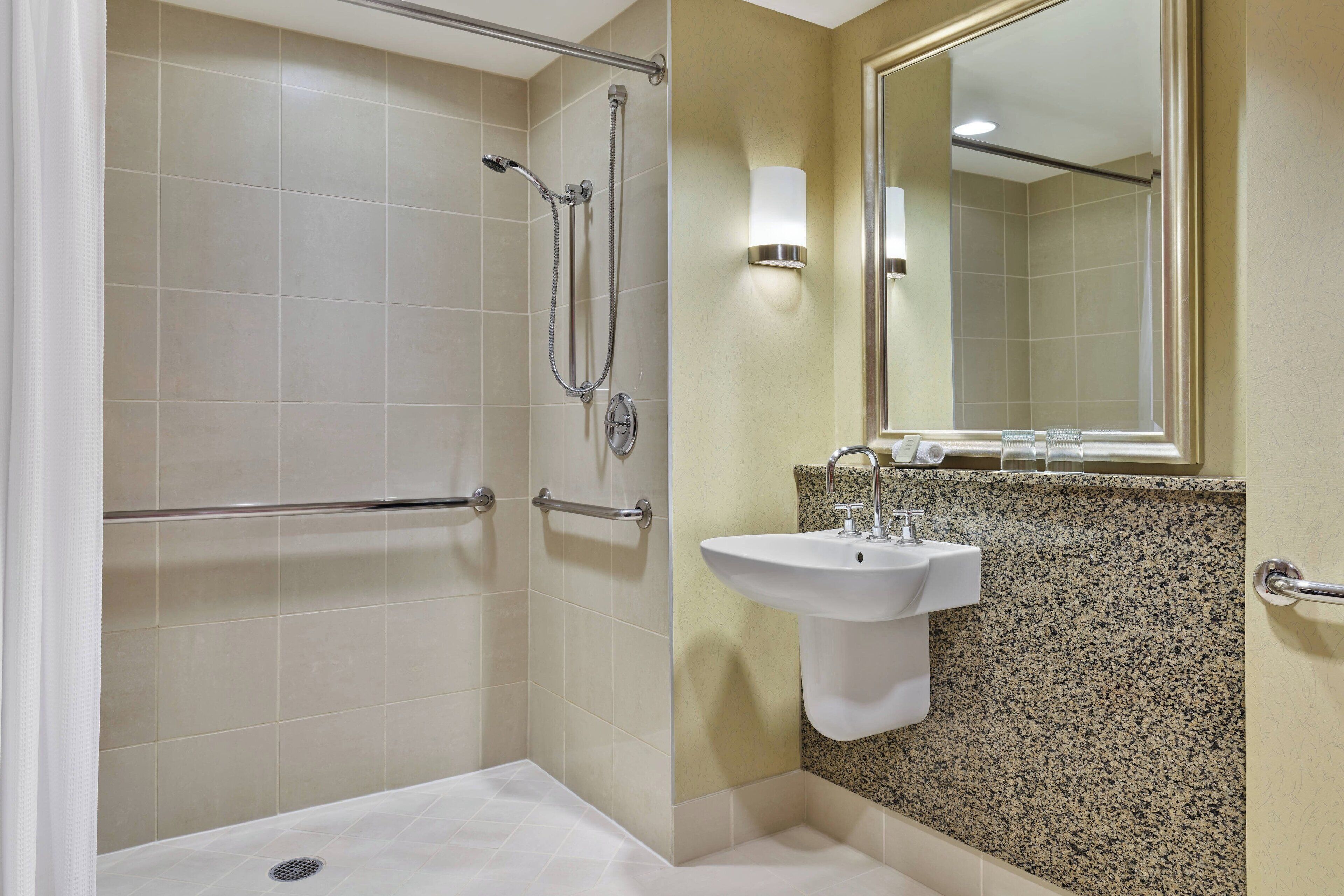 separate bathtub and shower, designer toiletries, hair dryer, towels