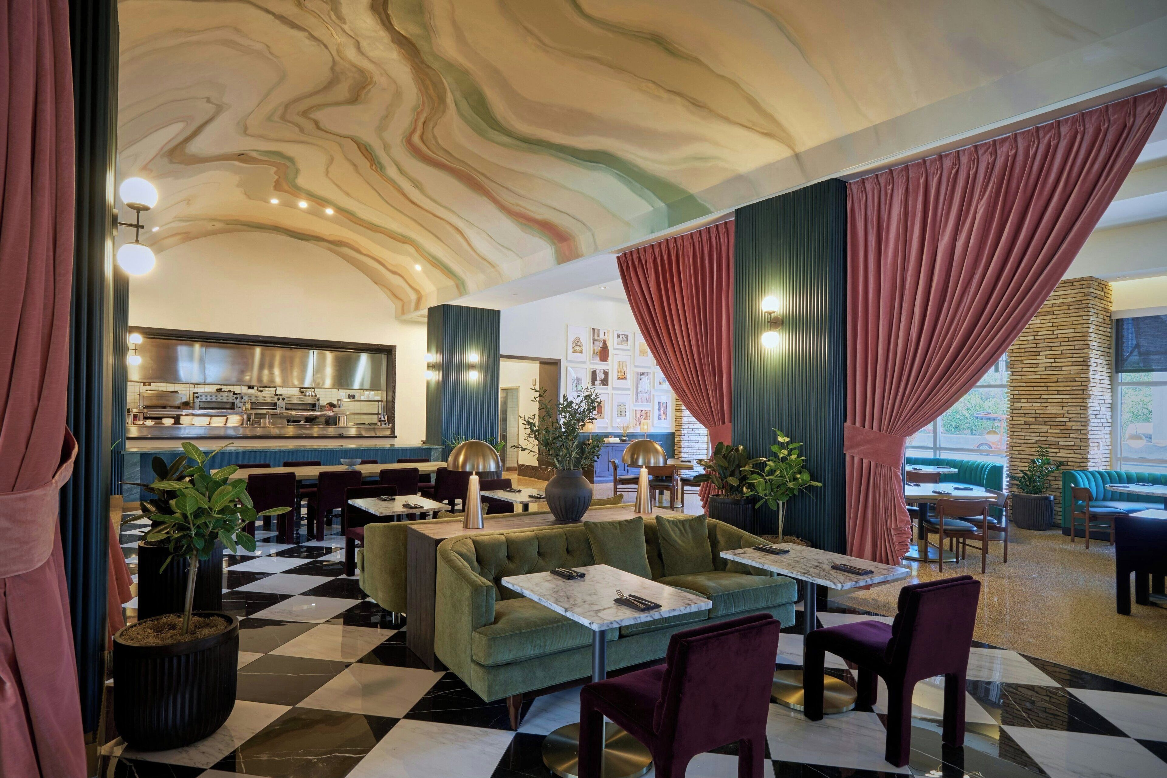 2 restaurants, breakfast, lunch, dinner served; american cuisine