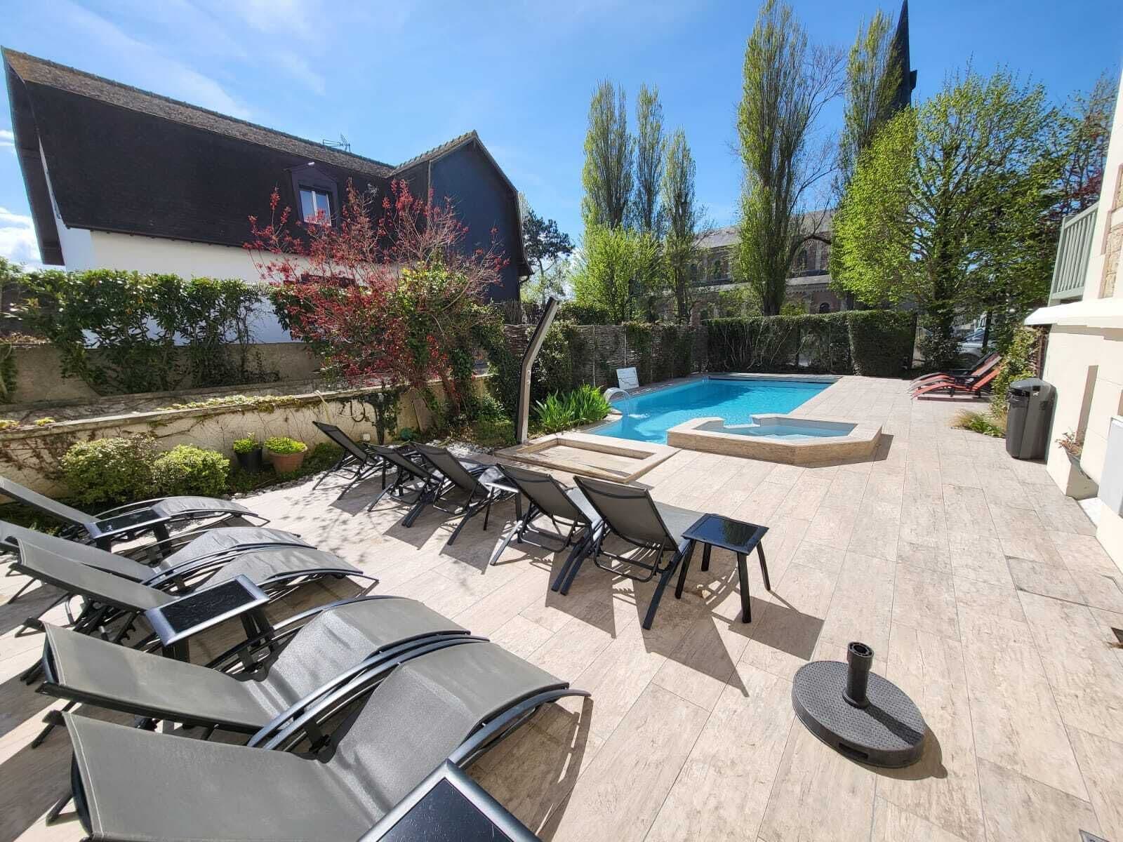 seasonal outdoor pool, open 8:00 am to 9:00 pm, pool umbrellas