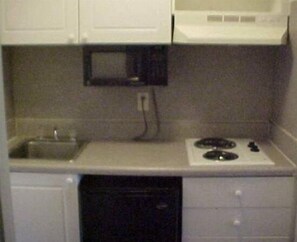 Fridge, microwave, stovetop, coffee/tea maker