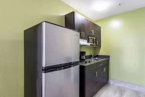 Fridge, microwave, stovetop, coffee/tea maker