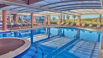 Indoor pool, outdoor pool, open 9:30 AM to 7:30 PM, pool loungers