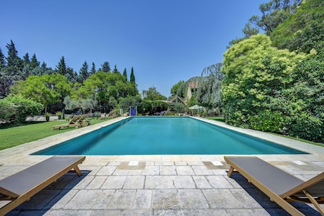 Outdoor pool, pool umbrellas, sun loungers