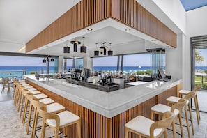 5 bars/lounges, 2 poolside bars, beach bar