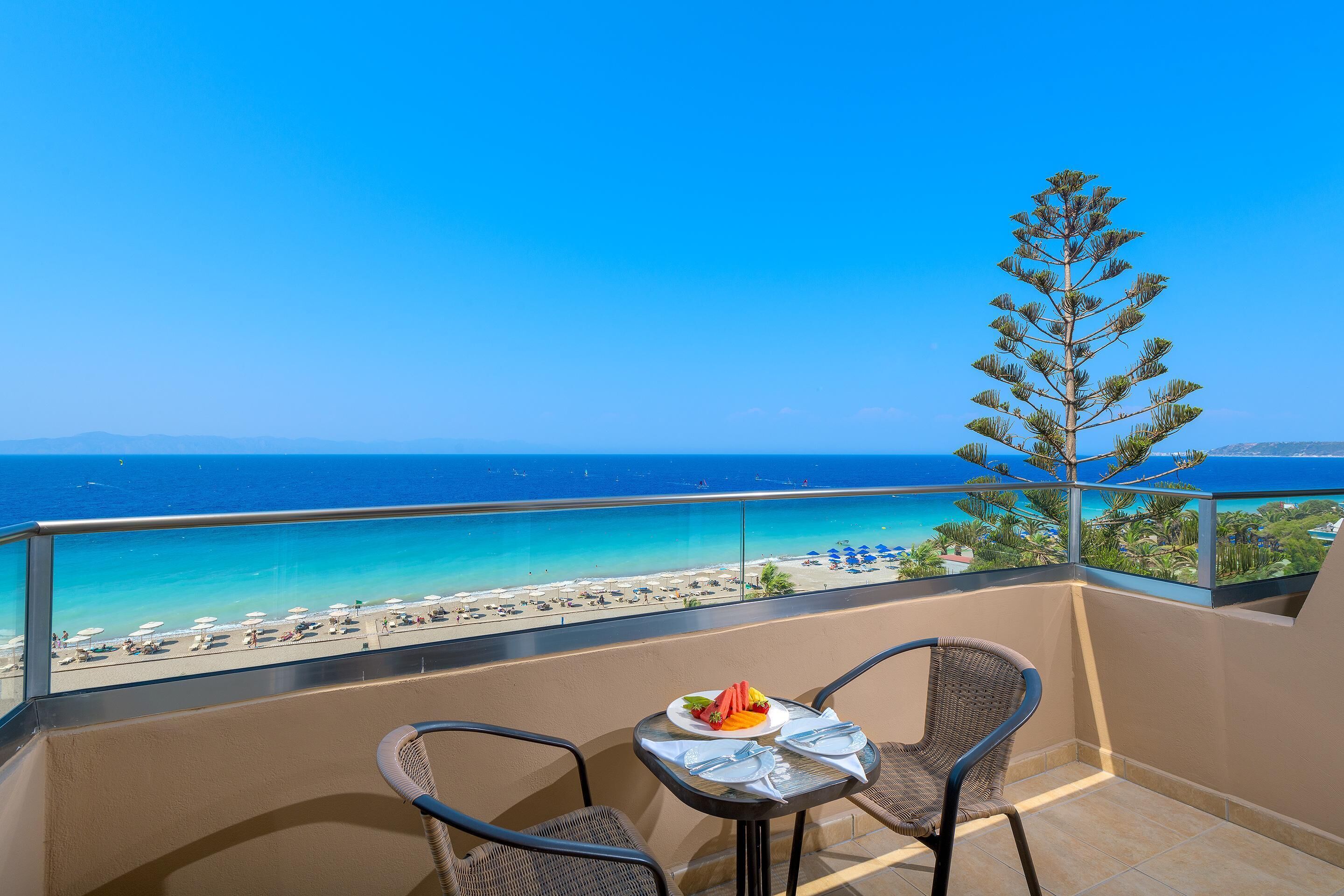 Deluxe Apartment, Sea View (Beachfront Wing) | Outdoor dining | 2 restaurants, breakfast served