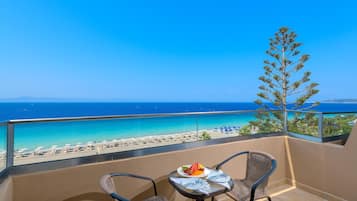Deluxe Apartment, Sea View (Beachfront Wing) | Outdoor dining | 2 restaurants, breakfast served