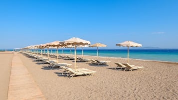 Private beach, sun loungers, beach umbrellas, beach towels