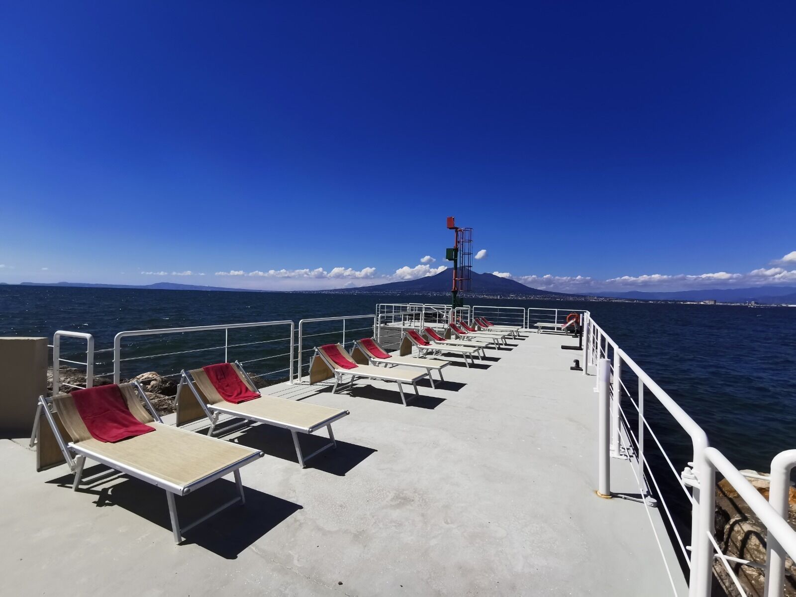 private beach, sun-loungers, beach umbrellas, beach towels