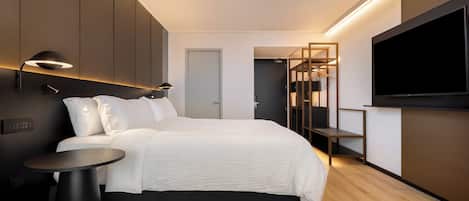 Premium bedding, memory-foam beds, in-room safe, desk