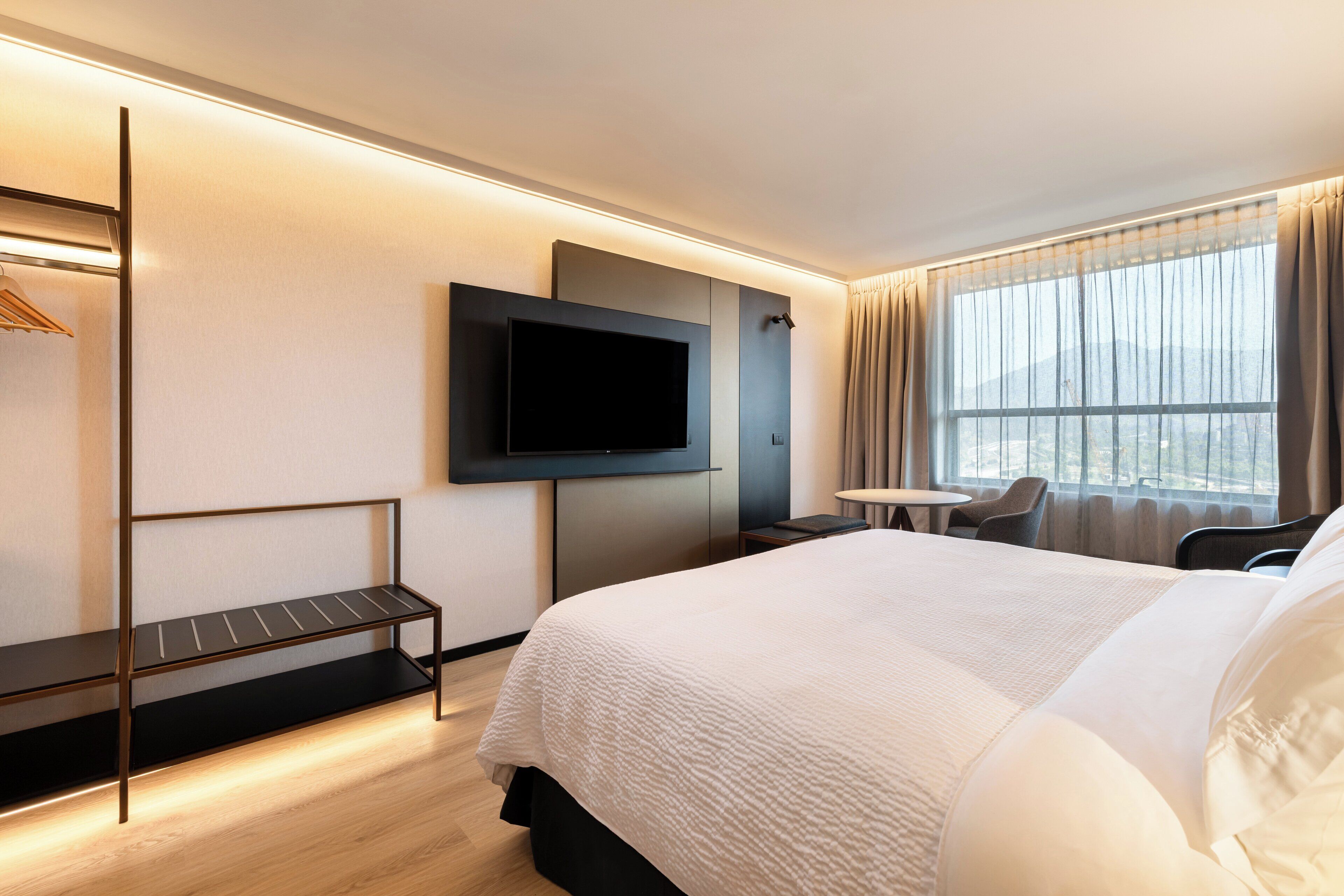 Premium bedding, memory-foam beds, in-room safe, desk