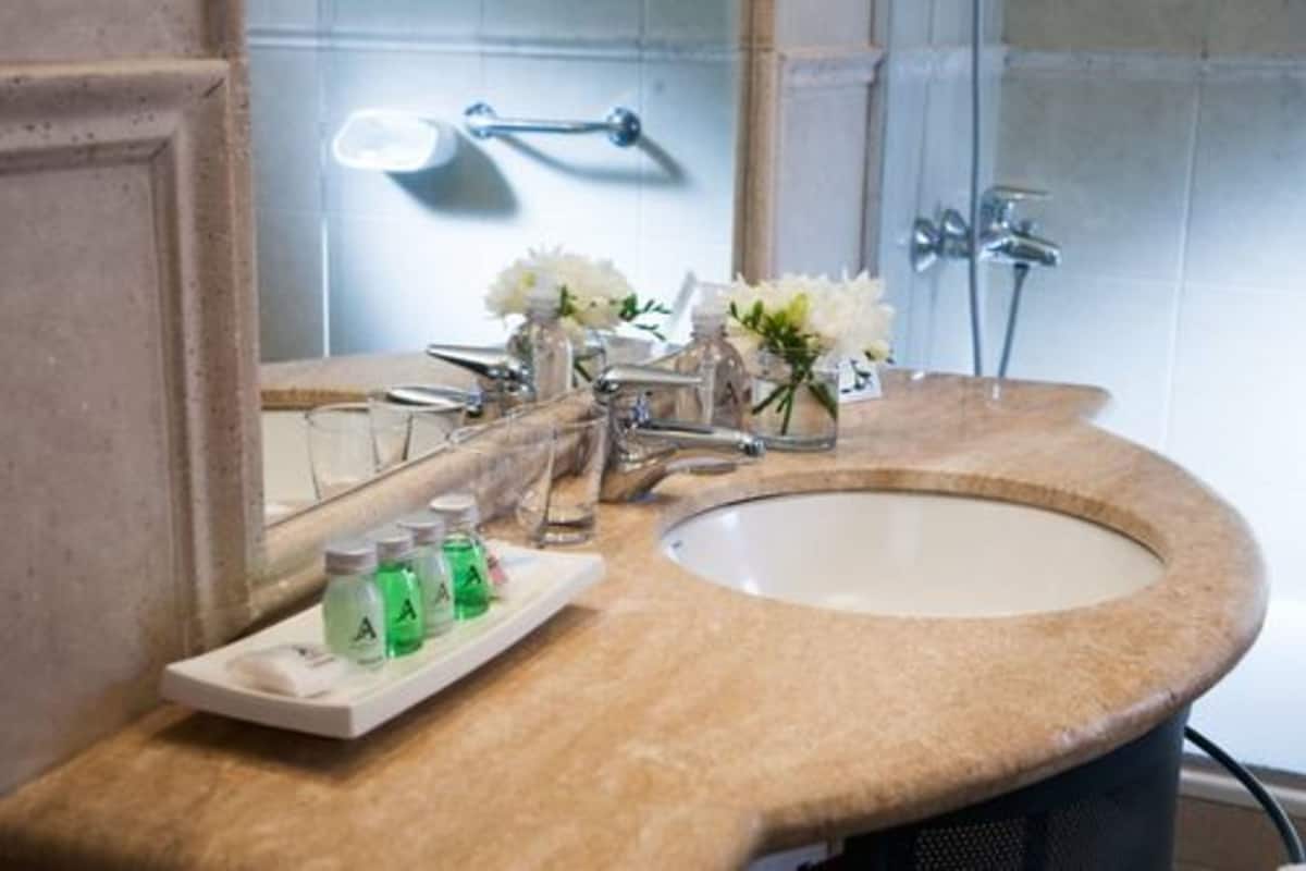 executive double or twin room | bathroom amenities | designer toiletries, hair dryer, bidet, towels