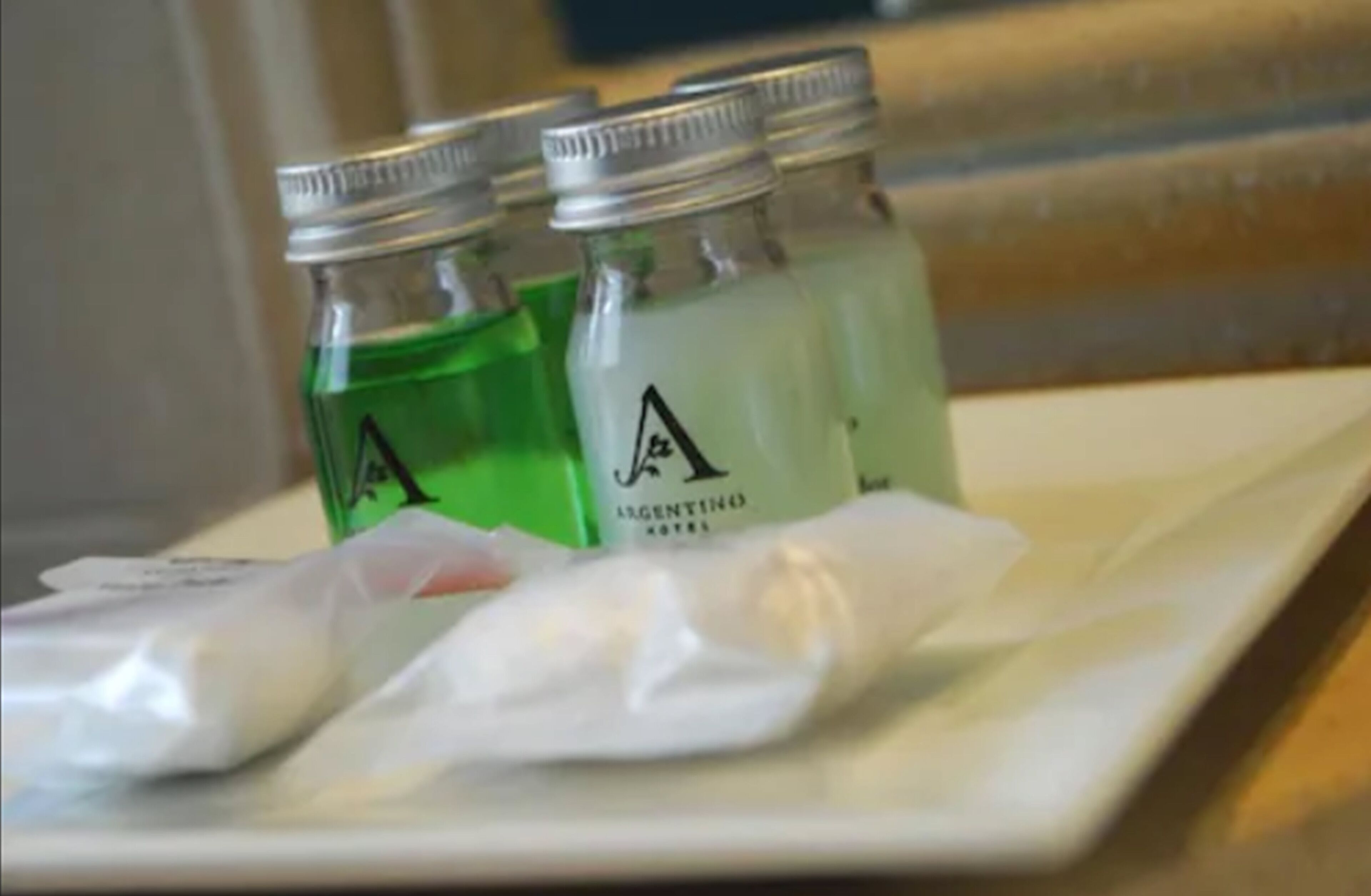 designer toiletries, hair dryer, bidet, towels