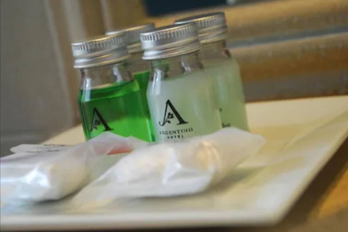 designer toiletries, hair dryer, bidet, towels