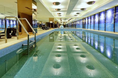 Indoor pool, open noon to 8:00 PM, lifeguards on site