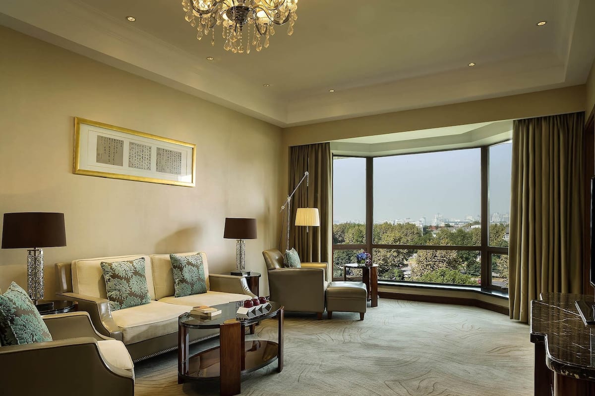 Suite, 1 King Bed (Prestige) | 1 bedroom, premium bedding, down comforters, minibar