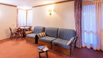 Chambre familiale | Minibar, coffre-fort, bureau, rideaux d’obscurcissement