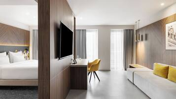 Junior Suite, 1 King Bed | Minibar, in-room safe, desk, laptop workspace