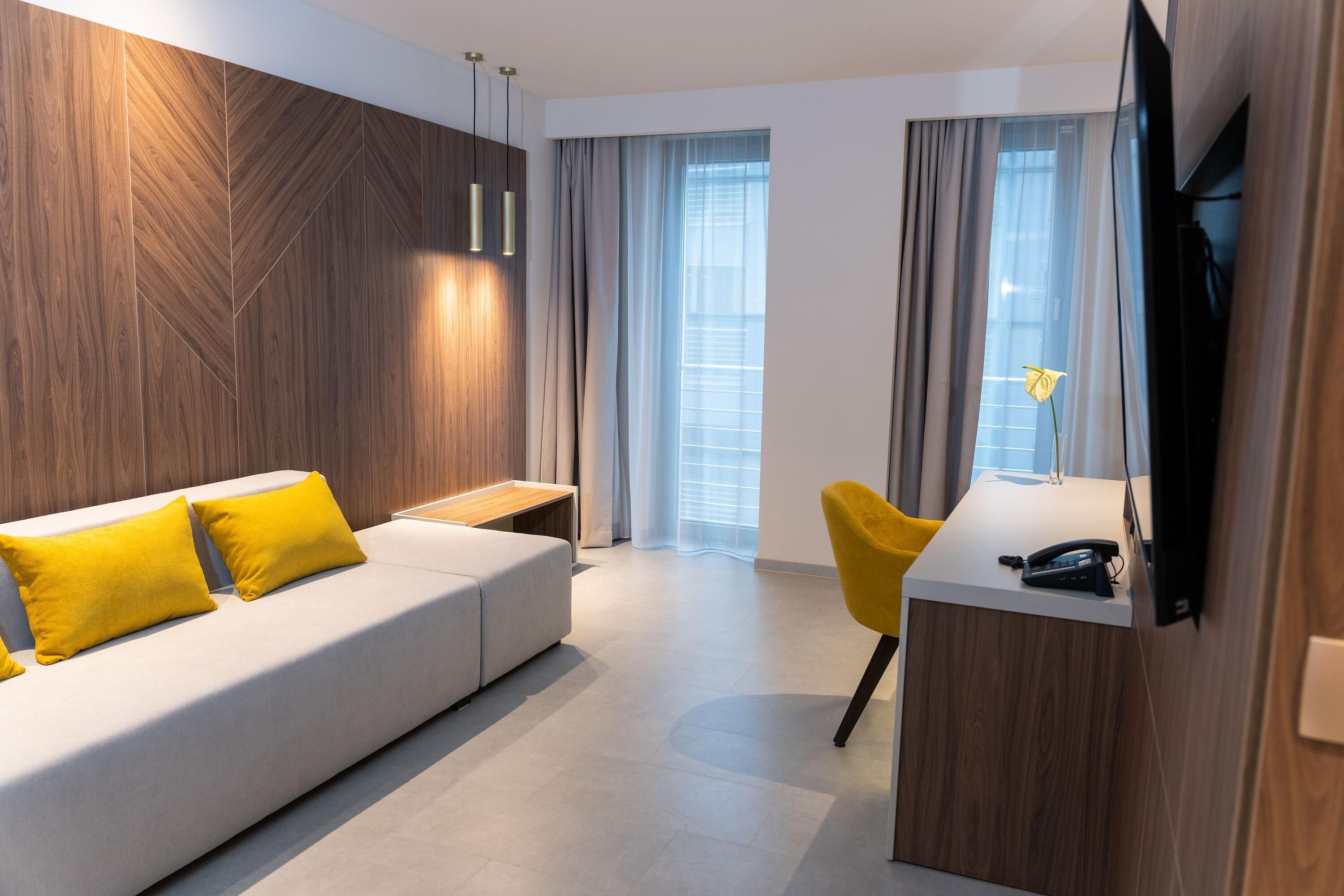 junior suite | 1 bedroom, minibar, in-room safe, blackout curtains