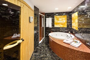 Suite, 1 Bedroom | Bathroom | Deep soaking tub, hair dryer, slippers, towels - Doubletree by Hilton Ljubljana (Ljubljana)