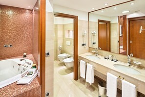 Suite, 1 Bedroom | Bathroom | Deep soaking tub, hair dryer, slippers, towels - Doubletree by Hilton Ljubljana (Ljubljana)