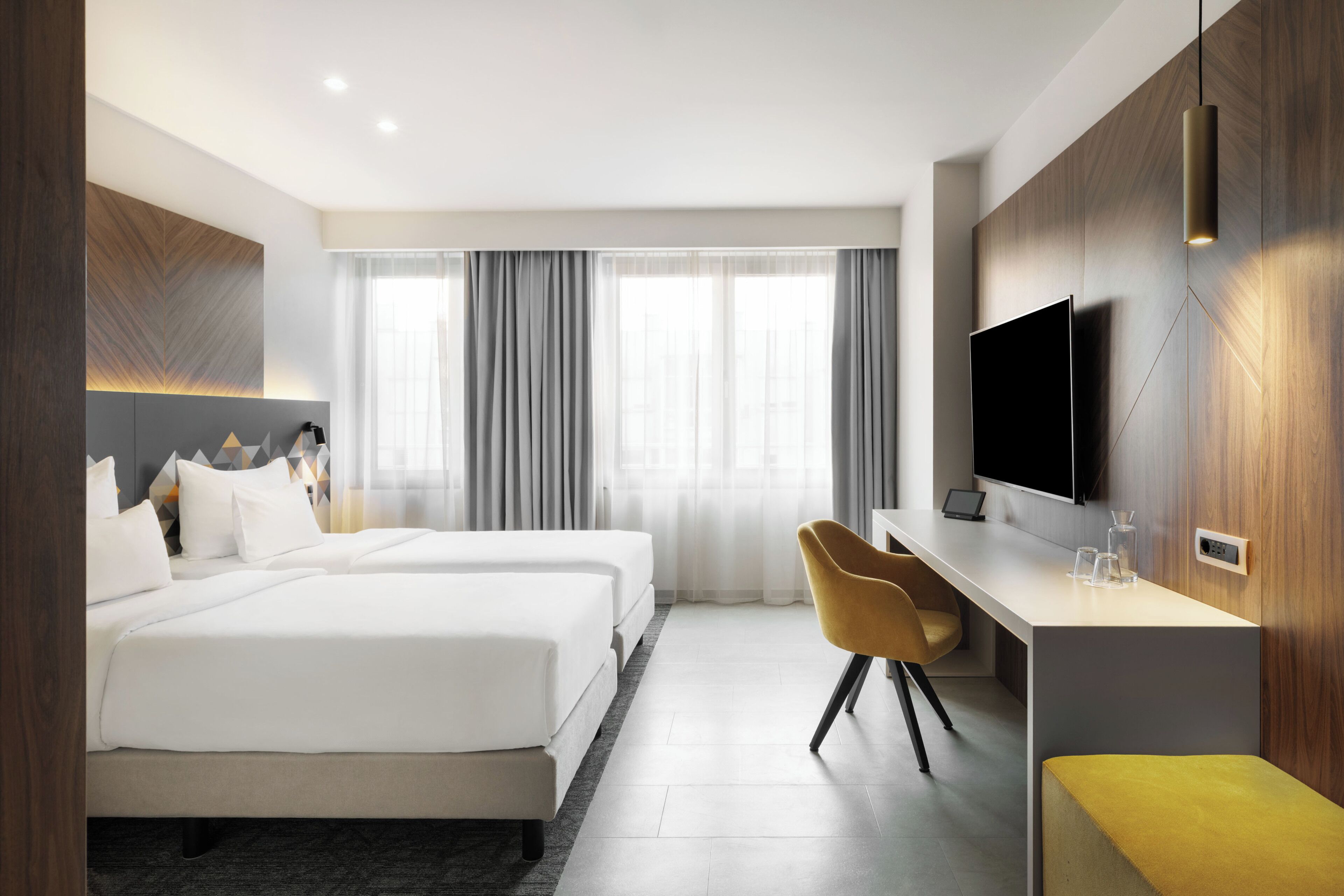 Standaard kamer, 2 eenpersoonsbedden (Guest) | Een minibar, een kluis op de kamer, een bureau, een laptopwerkplek