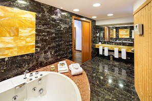Suite, 1 Bedroom | Bathroom | Deep soaking tub, hair dryer, slippers, towels - Doubletree by Hilton Ljubljana (Ljubljana)