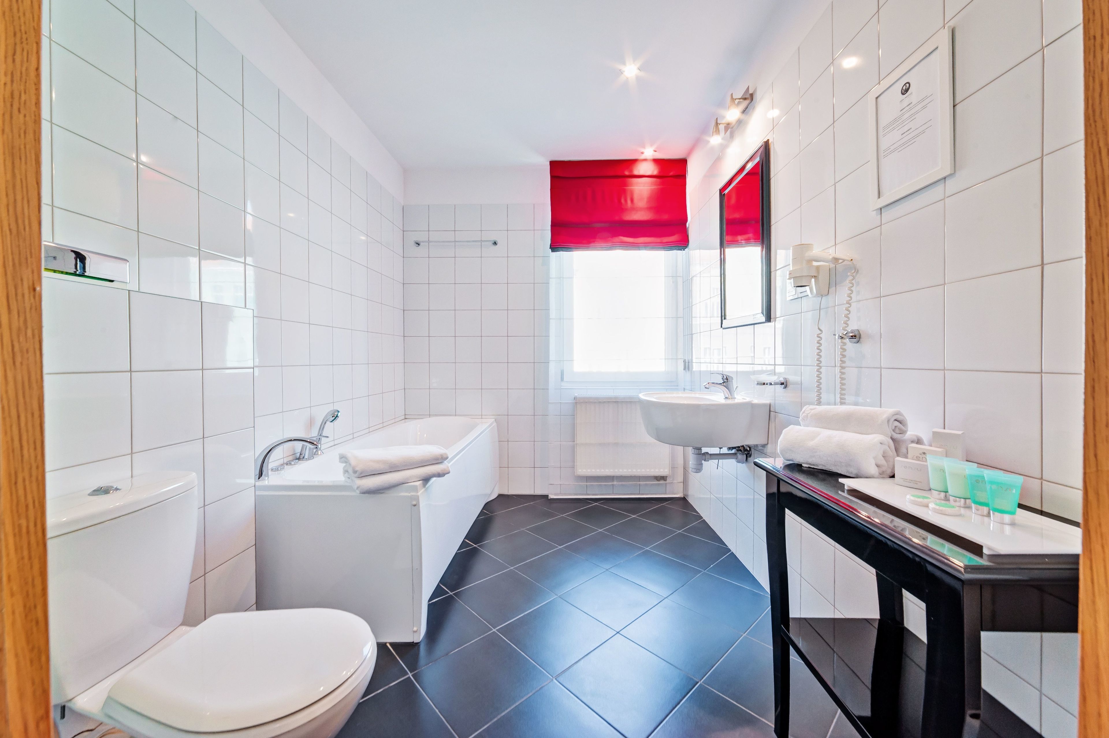 deluxe apartment | bathroom | free toiletries, hair dryer, bathrobes, slippers