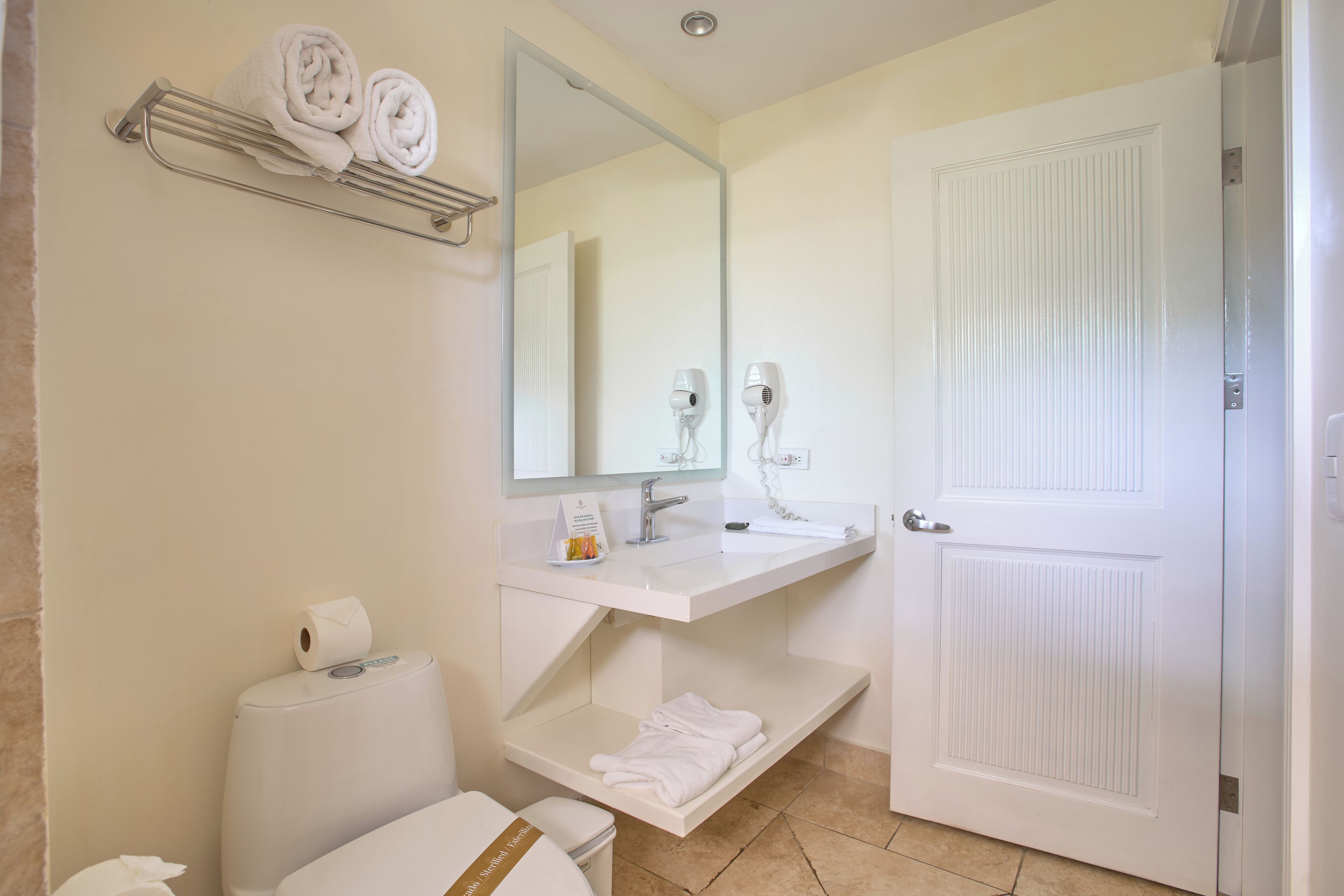 family pool view queen beds | bathroom | shower, free toiletries, hair dryer, bathrobes