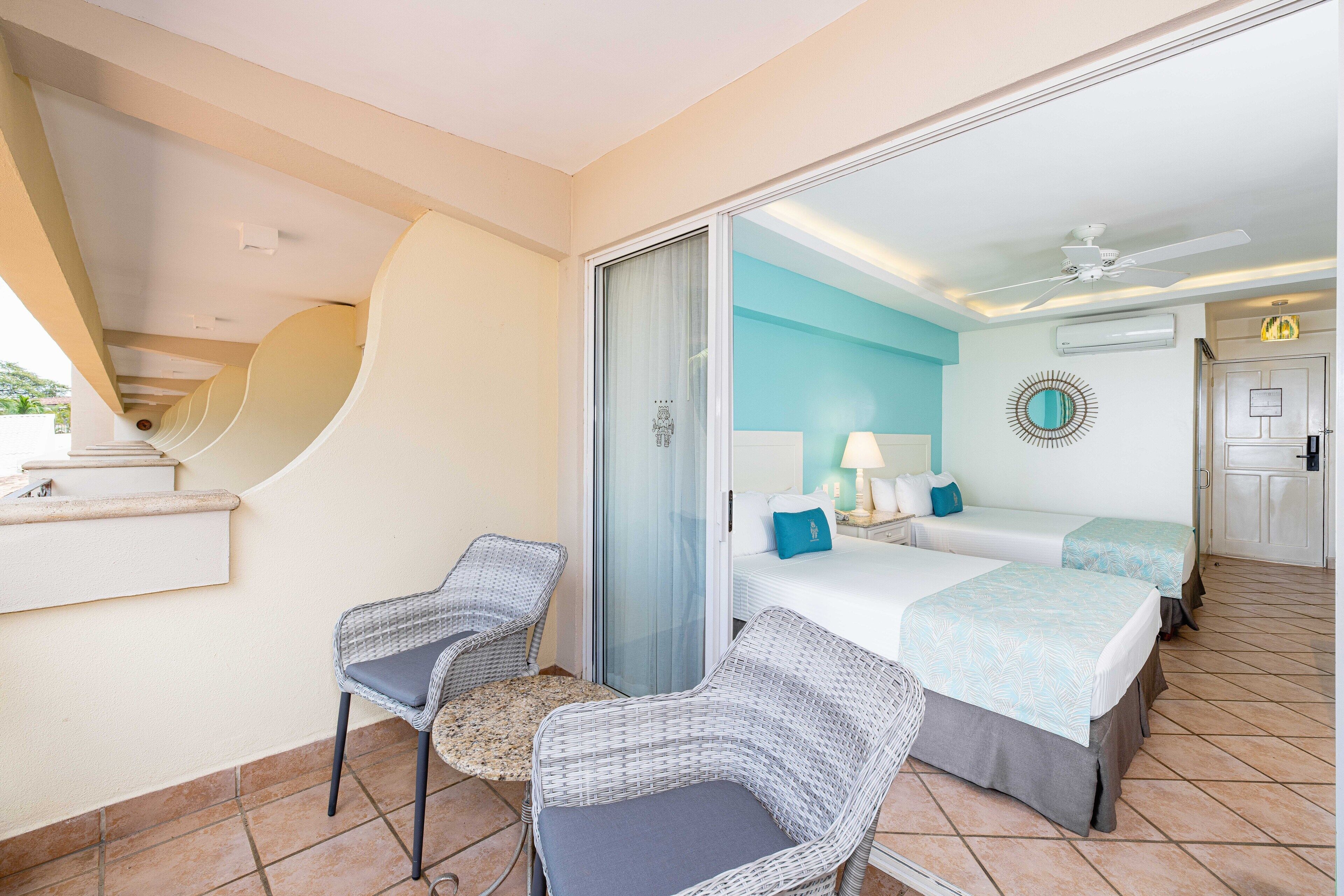 sunset ocean view queen beds | premium bedding, minibar, in-room safe, individually decorated