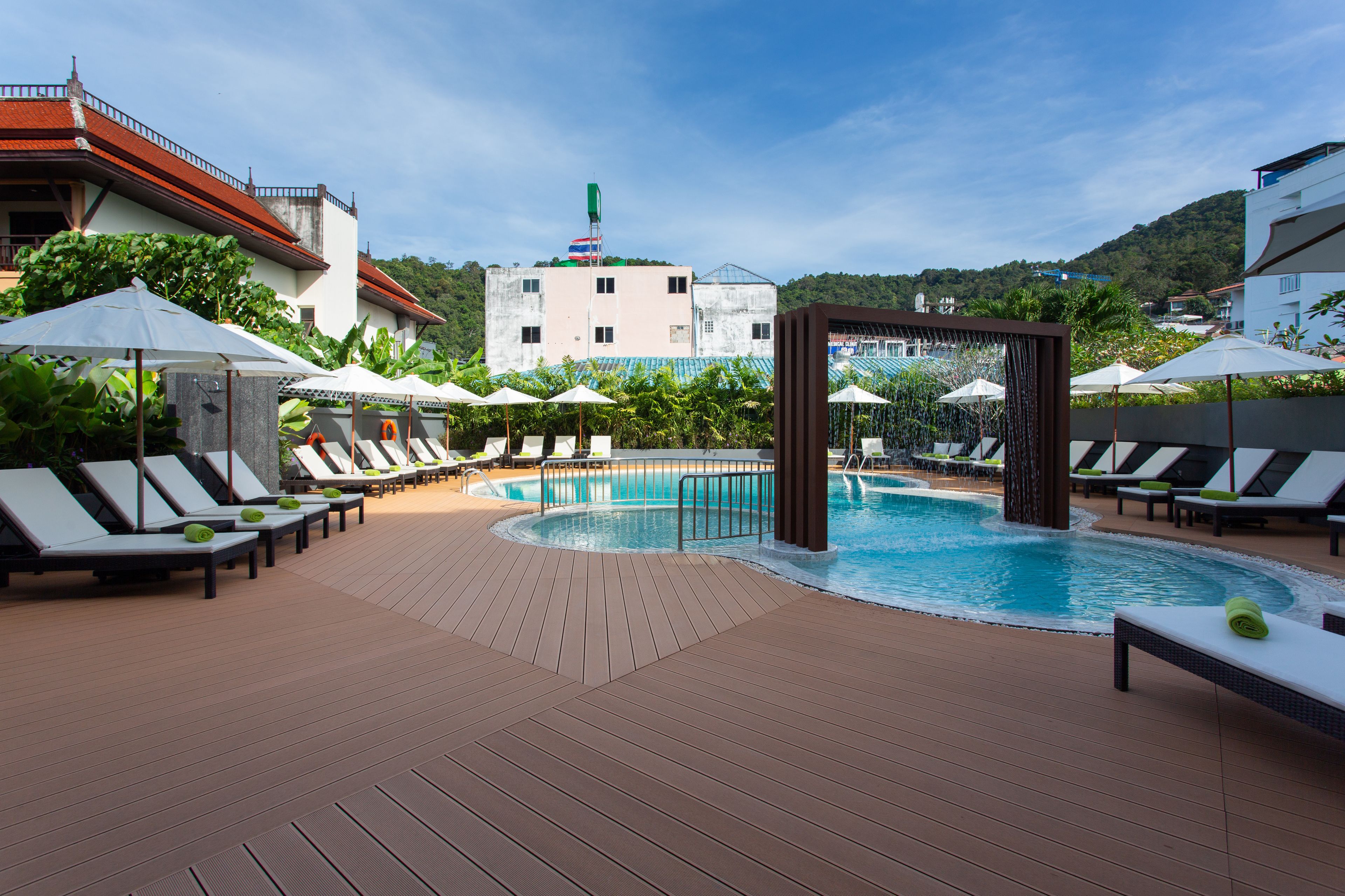 outdoor pool, pool umbrellas, pool loungers