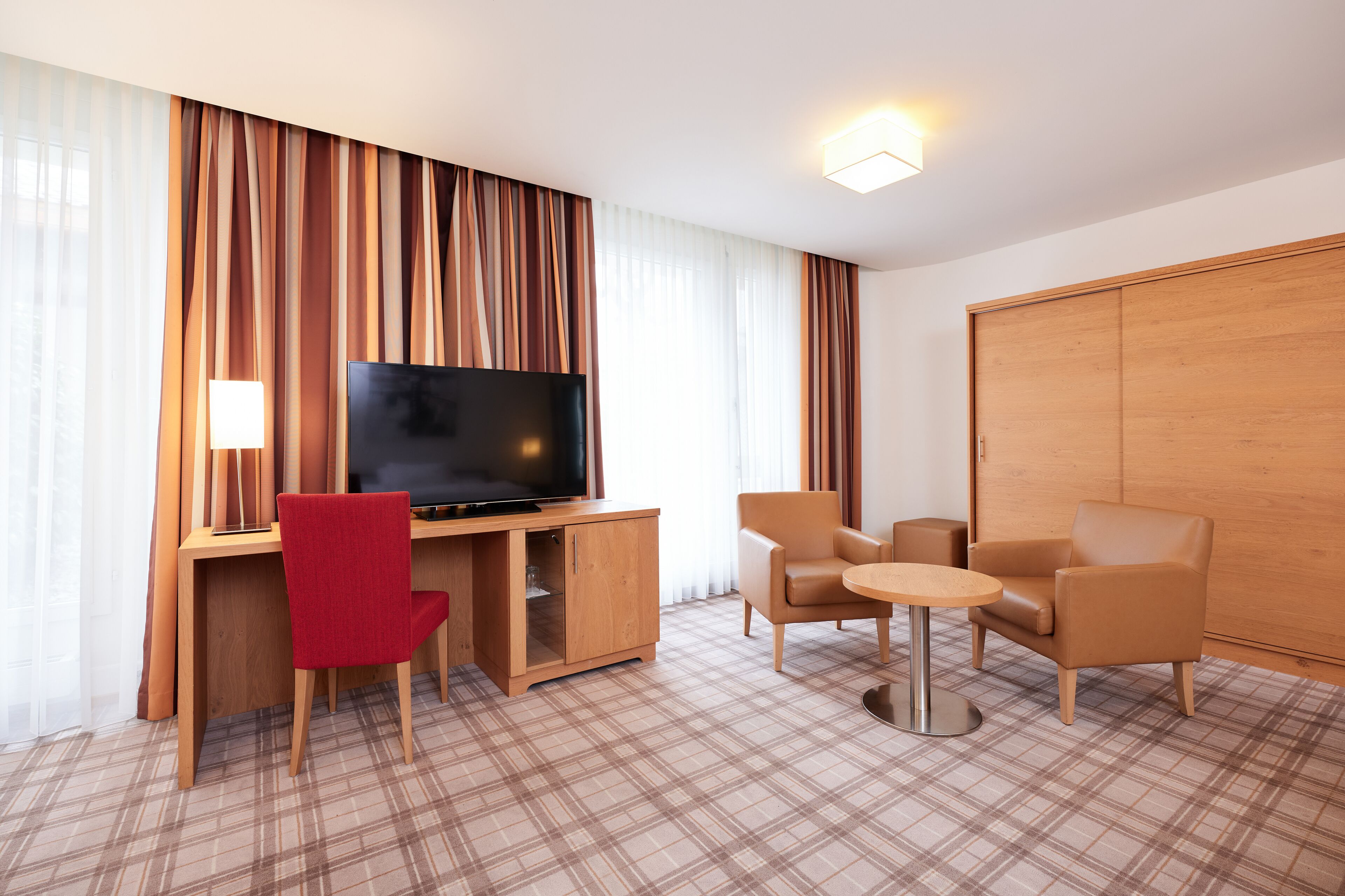 quadruple room | minibar, in-room safe, desk, blackout curtains