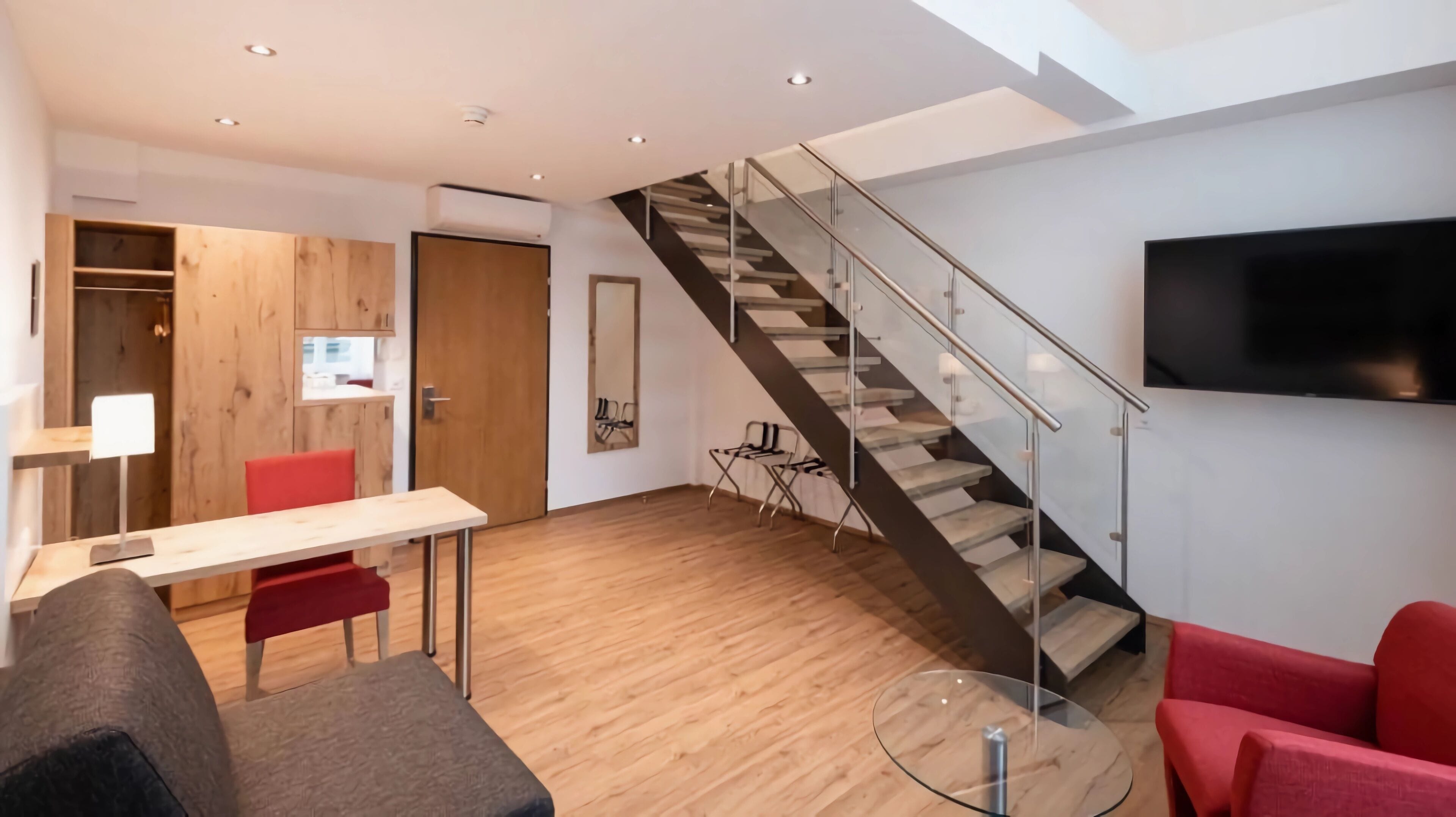 executive quadruple room | minibar, in-room safe, desk, blackout curtains