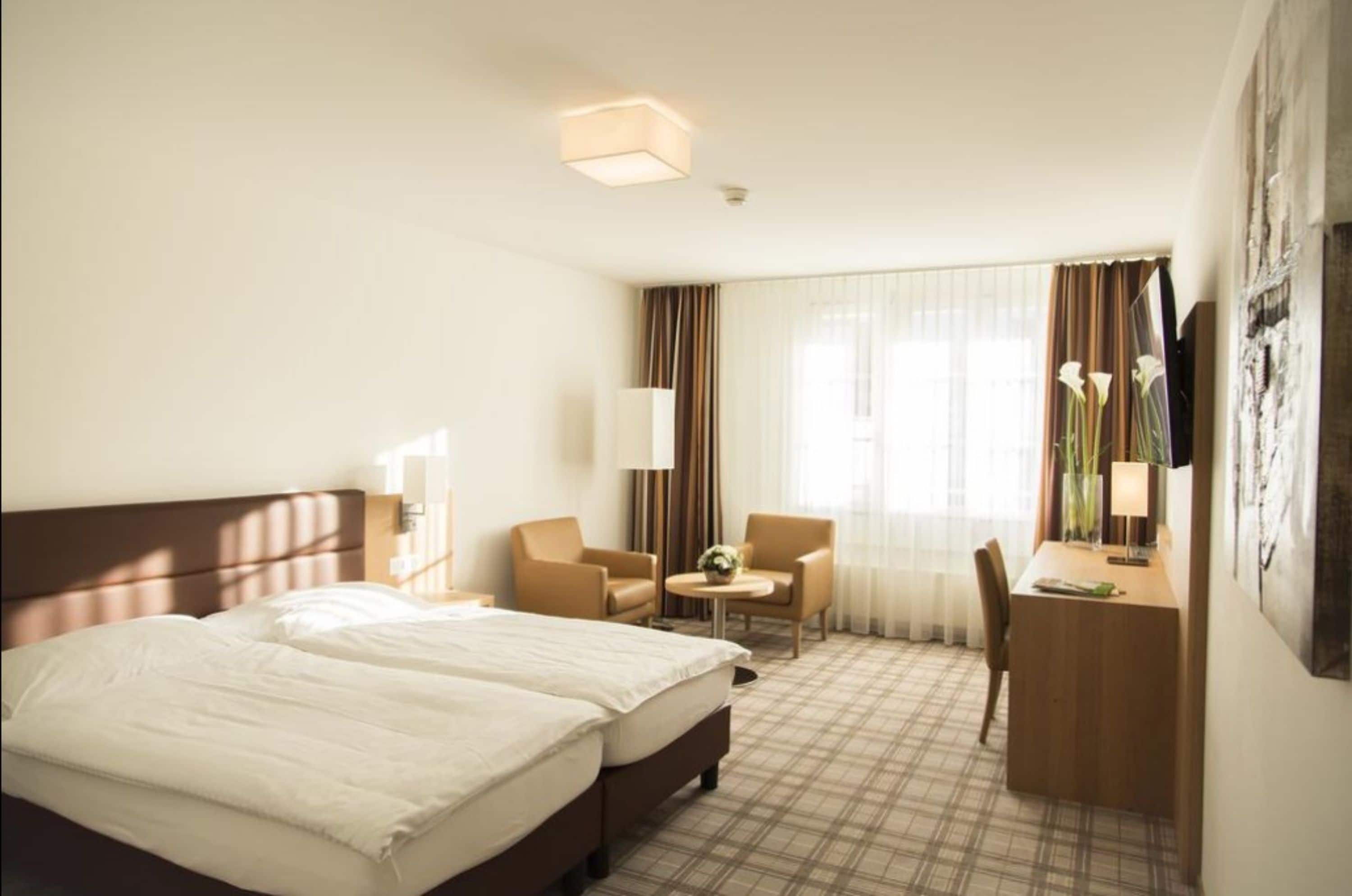 double or twin room | minibar, in-room safe, desk, blackout curtains