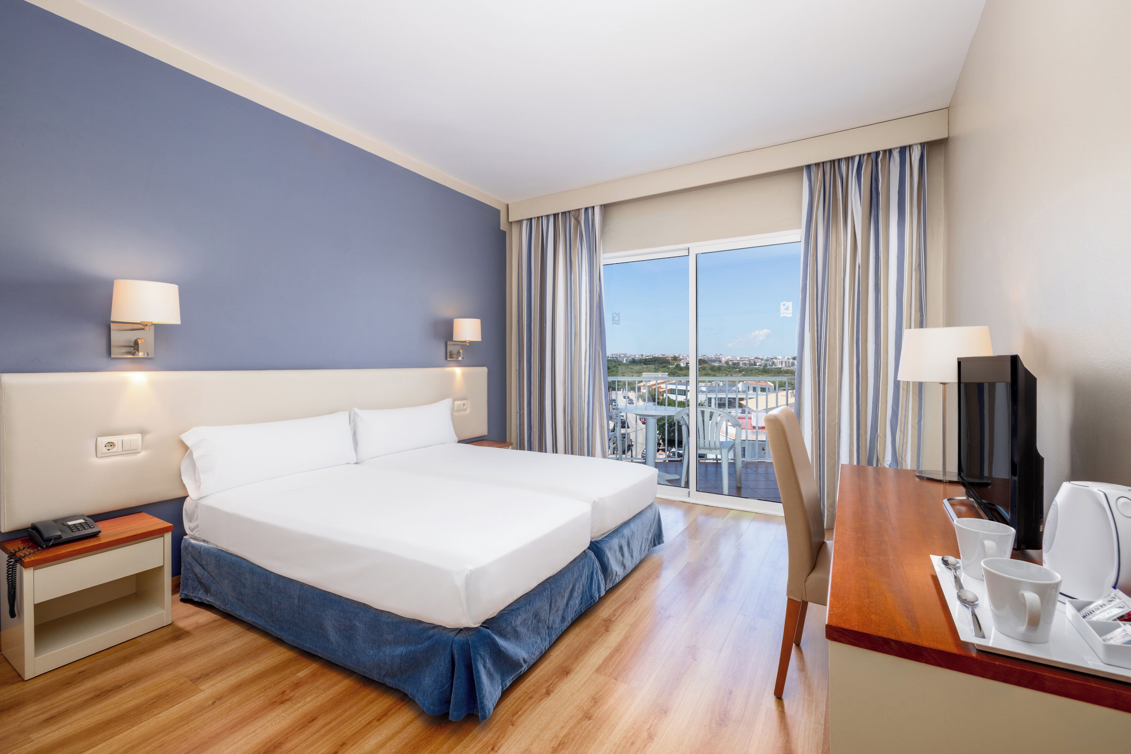 Minibar, desk, blackout drapes, free WiFi