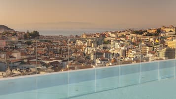 Indoor pool, outdoor pool, pool umbrellas, pool loungers