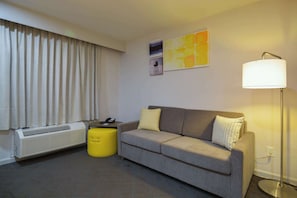 Suite, 1 King Bed, Non Smoking | Desk, laptop workspace, blackout drapes, iron/ironing board - Comfort Inn & Suites Moreno Valley near March Air Reserve Base (Moreno Valley)