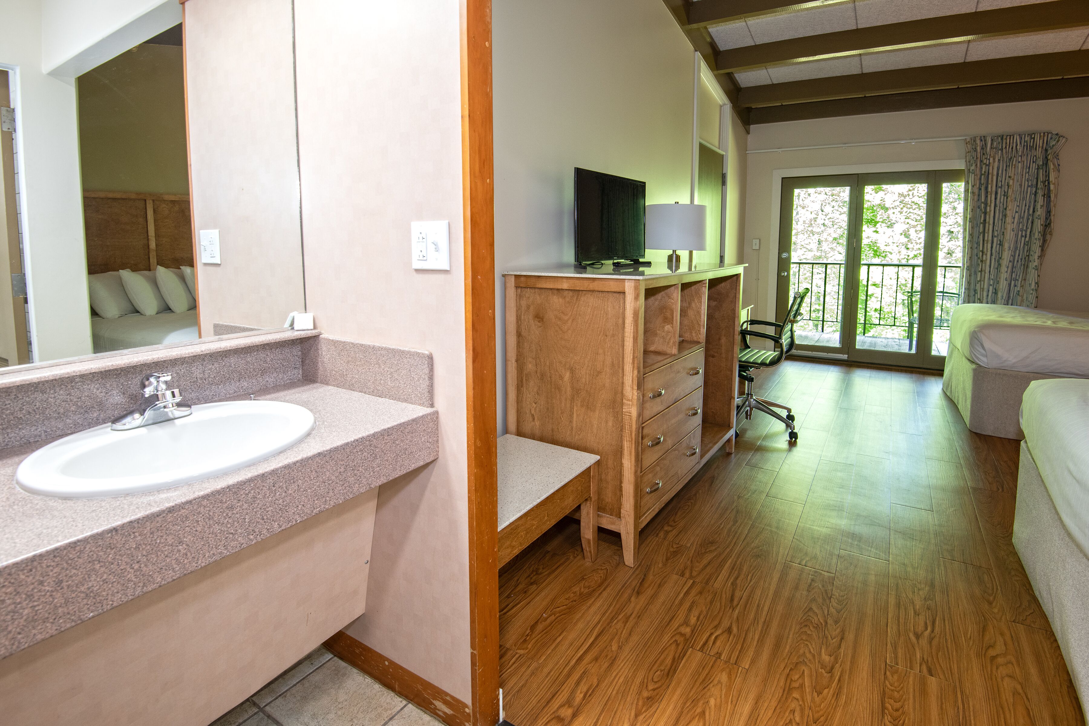 room, 2 double beds | bathroom sink