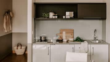 Fridge, microwave, stovetop, coffee/tea maker