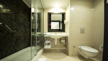 Shower, free toiletries, hair dryer, slippers