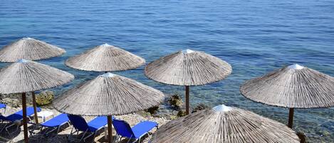 Private beach nearby, black sand, sun-loungers, beach umbrellas