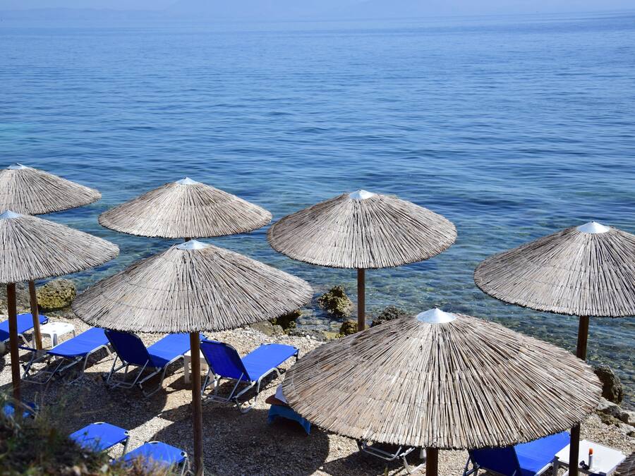 Private beach nearby, black sand, sun loungers, beach umbrellas