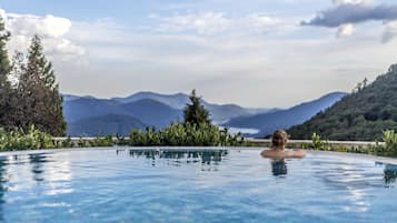 Indoor pool, outdoor pool, open 8:00 AM to 8:00 PM, pool umbrellas