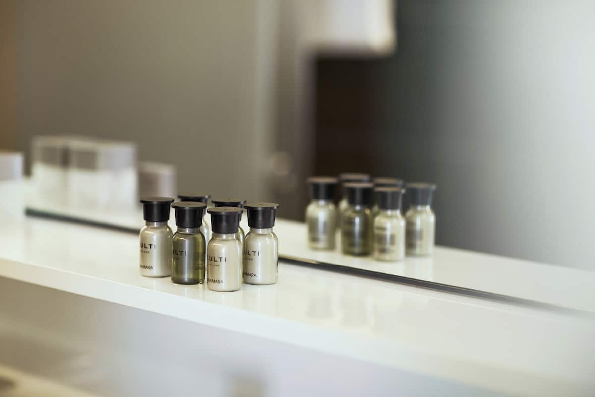 deluxe double or twin room countryside view | bathroom | designer toiletries, hair dryer, slippers, towels