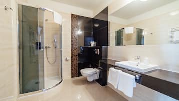 Shower, eco-friendly toiletries, hair dryer, towels