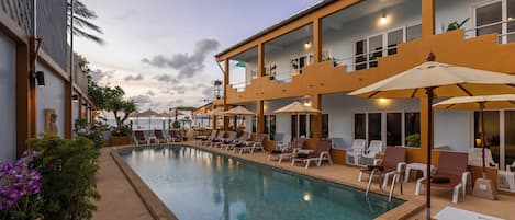 Outdoor pool, pool umbrellas, pool loungers