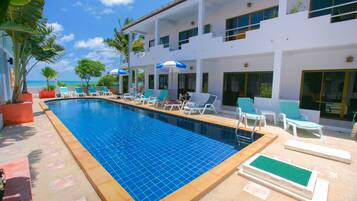 Outdoor pool, pool umbrellas, pool loungers