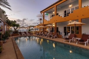 Outdoor pool, pool umbrellas, sun loungers