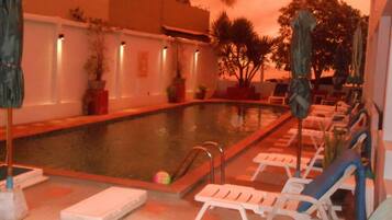 Outdoor pool, pool umbrellas, pool loungers
