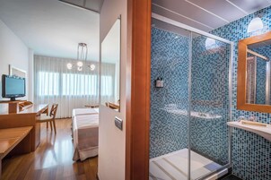 Superior Room | Minibar, in-room safe, individually furnished, desk